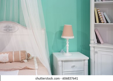 Pretty Girlish Bedroom Interior With Bed, Bookcase And Pink Lamp For Real Princess