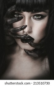 Pretty gothic pale brunette woman