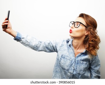 Pretty Hipster Girl Taking Selfie. 