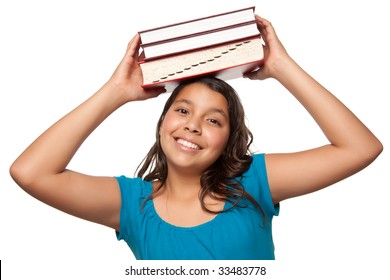 Pretty Hispanic Teen Aged Girl with Books on Her Head Ready for School Isolated on a White Background.