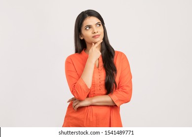 Pretty Indian Girl Thinking On White.