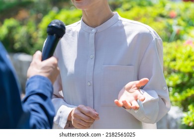 Pretty Japanese Woman Interviewed Outside