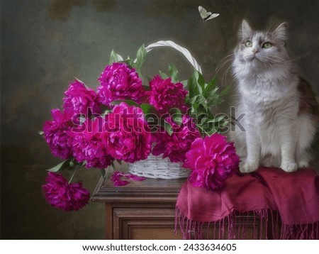 Pretty kitty and bouquet of purple peonies