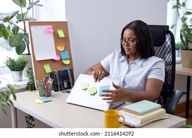 pretty lady opening laptop going to work in the morning in office, alone, workplace. attractive woman in white formal shirt preparing to work, business ideas and plans. online work, job, profession