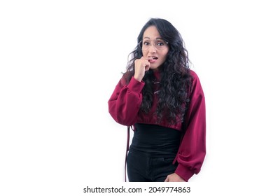 Pretty Latin Hispanic Woman With Long Thick Hair Wearing Glasses On White Background Indoors Making Expressions And Gestures, Fearful, Distressed, Distressed, In Questio, With Hand On Face 