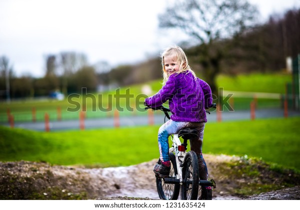 Pretty Little Girl Blonde Hair Purple Stock Photo Edit Now