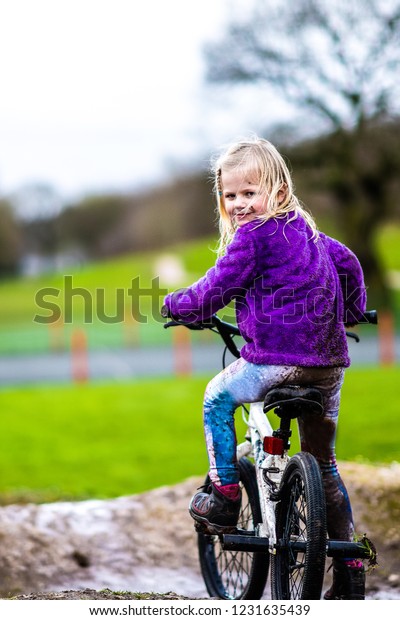 Pretty Little Girl Blonde Hair Purple Stock Photo Edit Now