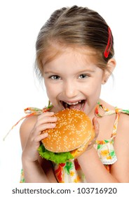 Pretty Little Girl Eating A Sandwich Isolated On White Background