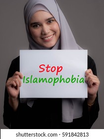 Pretty Model Wearing Hijab Hold A Paper With Text Stop Islamophobia