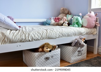 Pretty And Modern Kid's Bedroom With Stuffed Toys And Storage Solutions