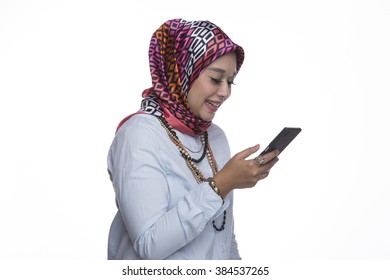 Pretty Muslim Lady With Mobile Phone On A White Background