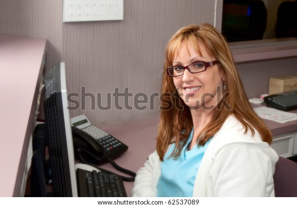 Pretty Receptionist Doctors Office Sitting Front Stock Photo (Edit Now
