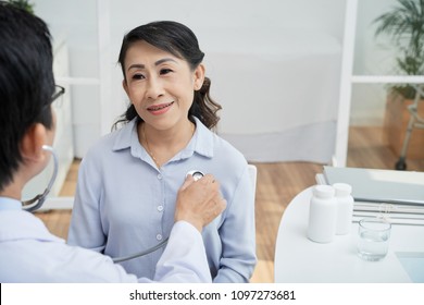 Pretty Senior Vietnamese Woman Having Her Heart Checked-up