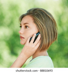 Pretty Serious Young Woman Short Hair Profile Talking Phone Summer Park