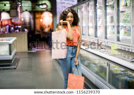 Similar – pink paper bags for shopping, inside the Christmas mask