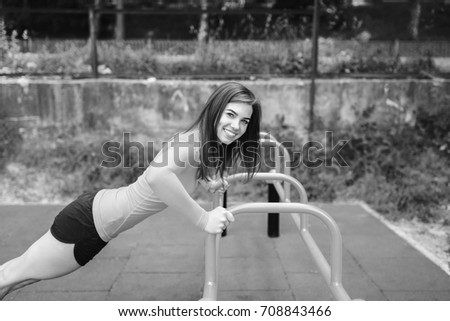 Similar – Image, Stock Photo Smiling brunette girl holding surfboard over her head