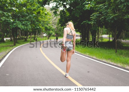 Similar – Image, Stock Photo Brunette girl holding surfboard over head and walking