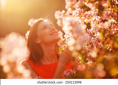 Pretty Spring Woman In The Garden.