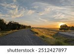 Pretty sunset over a levee in west sacramento 