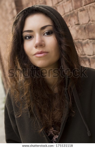 Pretty Suntanned Hispanic Teenager Girl Fluffy Stockfoto