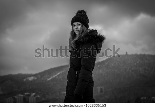 black coat teenage girl