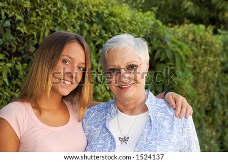 Similar – Woman taking selfie with older mother in wheelchair