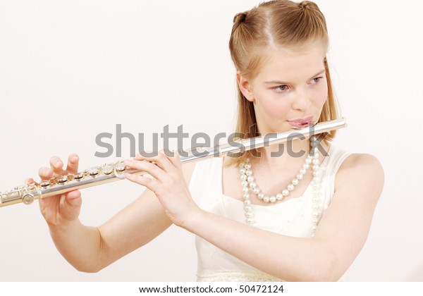 Pretty Teenager Girl Playing Flute Stock Photo 50472124 | Shutterstock