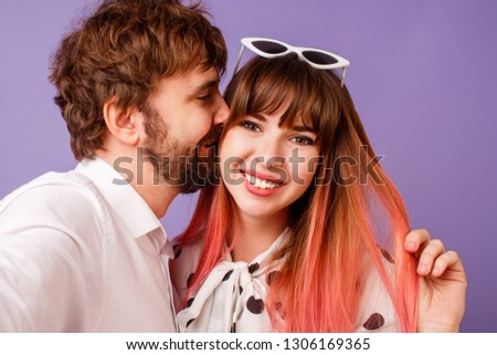 Similar – Young happy couple celebrating a birthday party