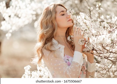 Pretty Woman In Cherry Blossom Garden, Spring Time