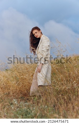 pretty woman coat outdoors walk autumn season concept