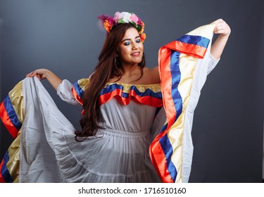 Pretty Woman Dancing Colombian Traditional Dance Isolated On Gray Background