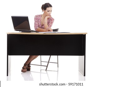 Pretty Woman In Desk With Computer, Isolated On White Background. Studio Shot.