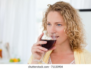 Pretty Woman Drinking Some Wine At Home