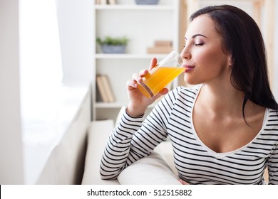 Pretty Woman Enjoying Healthy Drink