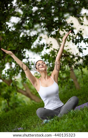 Similar – Young woman doing yoga in nature