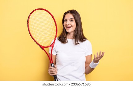 pretty woman feeling happy, surprised realizing a solution or idea. tennis player concept - Powered by Shutterstock