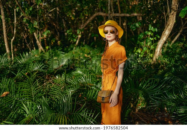 pretty woman\
hiker jungle green leaves travel\
sun