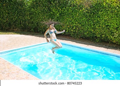 Pretty Woman Jumping To Swimming Pool.