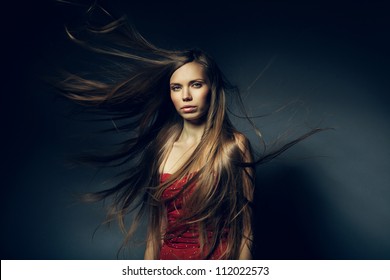 Pretty Woman With Long Windy Hair