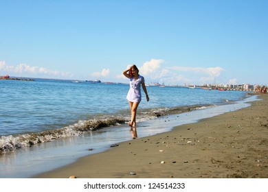 Pretty woman on beach in Limassol, Cyprus. - Shutterstock ID 124514233