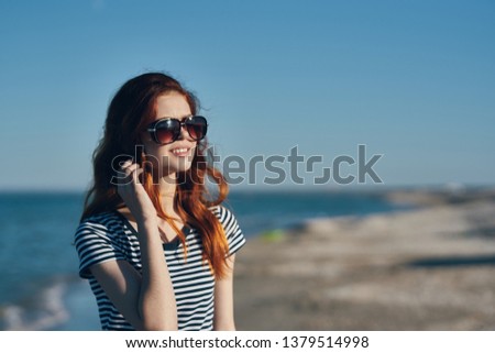 Pretty woman striped t-shirt nature vacation