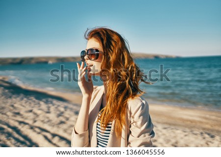 Pretty woman in sunglasses outdoors nature vacation beach