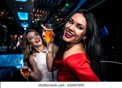 Pretty Women Having Party In A Limousine Car