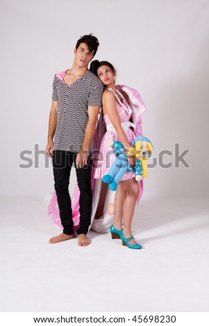 pretty young asian woman and man in a fashion portrait