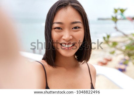 Similar – Image, Stock Photo unrecognizable young asian woman doing yoga in a park.Relax