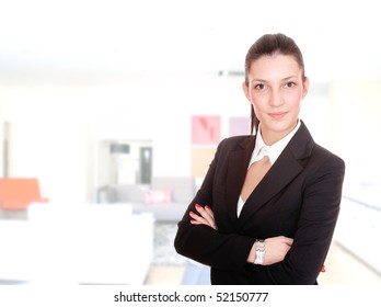 Pretty Young Business Woman In Interior