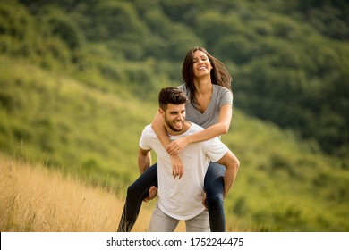 Pretty Young Couple In Love Outside In The Spring Nature