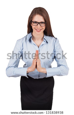 Pretty young dark-haired businesswoman welcomes us bowed