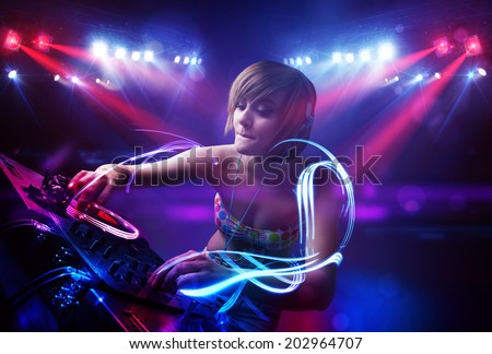 Similar – Young DJ woman in a night party