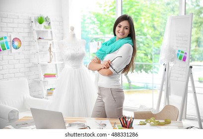 Pretty Young Dress Designer At Workplace